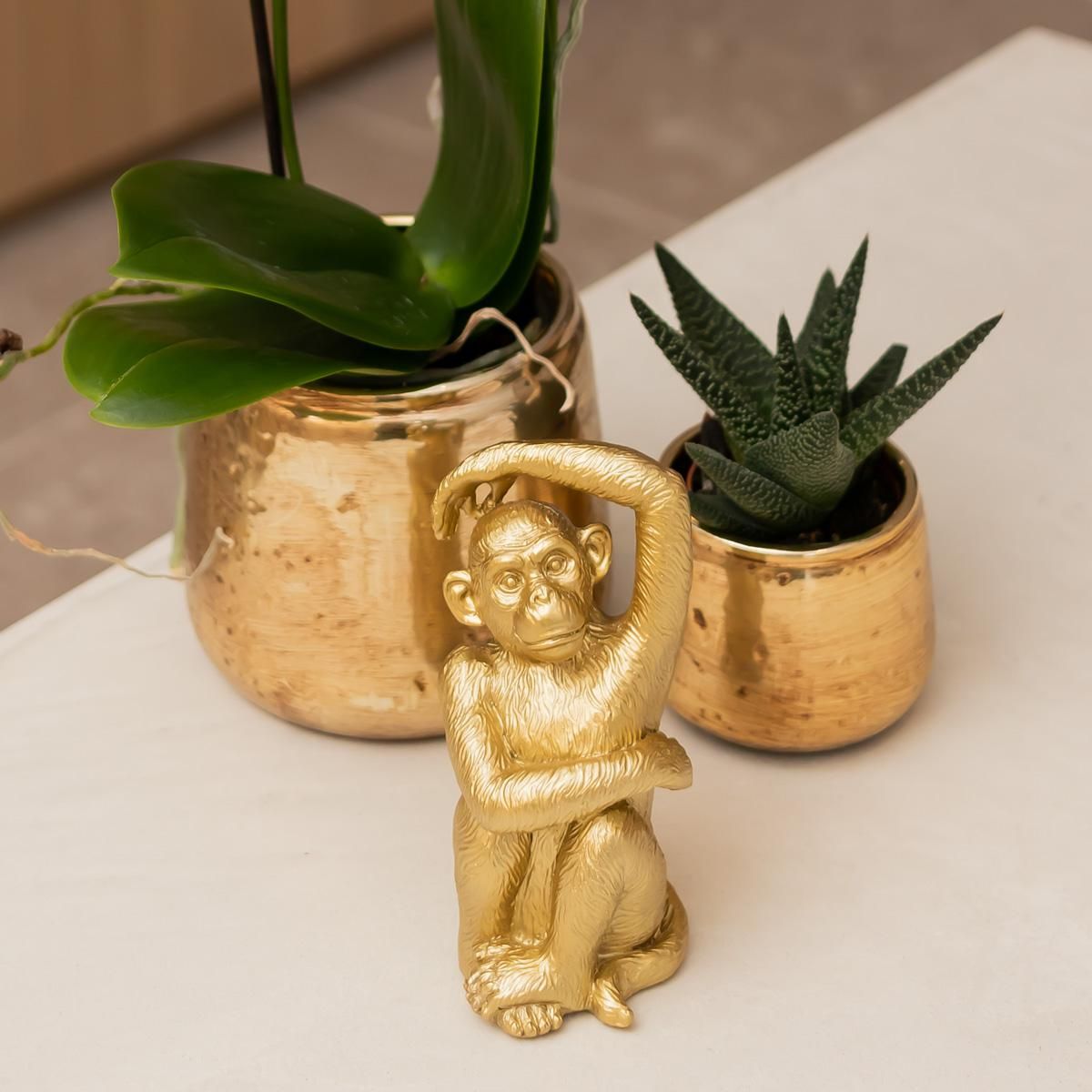 Dekofigur Sitzender Affe Gold aus Polystone